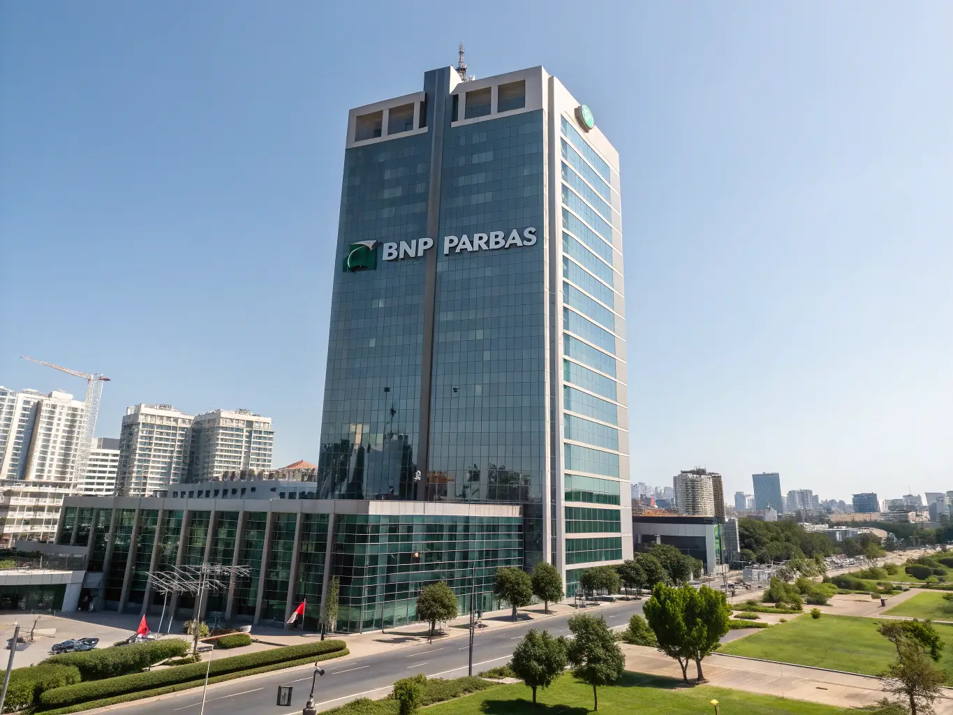 A modern office building in Bangkok, Thailand, with a bank logo visible, representing the ease of opening a bank account in Thailand.